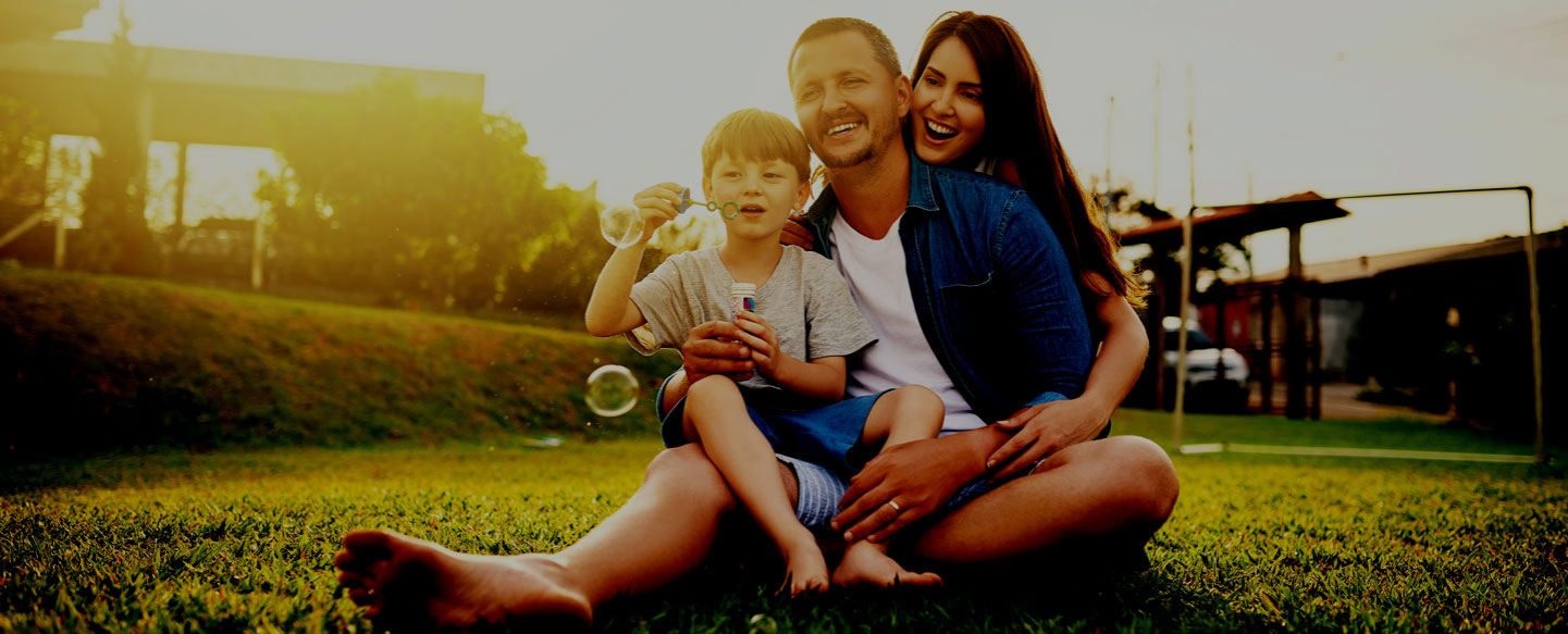 California family blowing bubbles